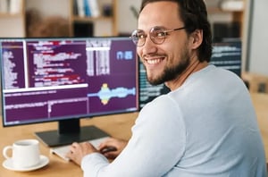 computer programmer smiles